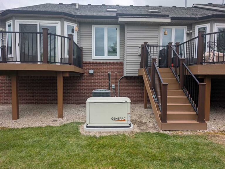 generac generator beside a home installed by Budget Electric & Generators